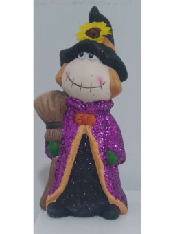 Bruja de Cerámica con Escoba . 19 de altura x 10,5cm de ancho