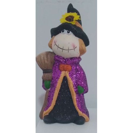 Bruja de Cerámica con Escoba . 19 de altura x 10,5cm de ancho