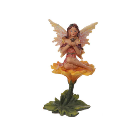 Hada Sentada Sobre Flor. 11 cm de alto x 11,5 de Ancho