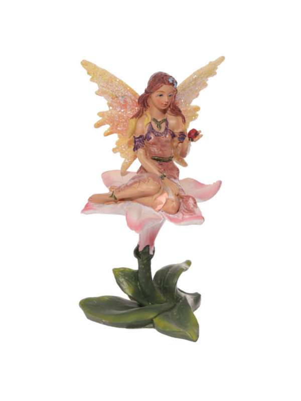 Hada Sentada Sobre Flor. 11 cm de alto x 11,5 de Ancho