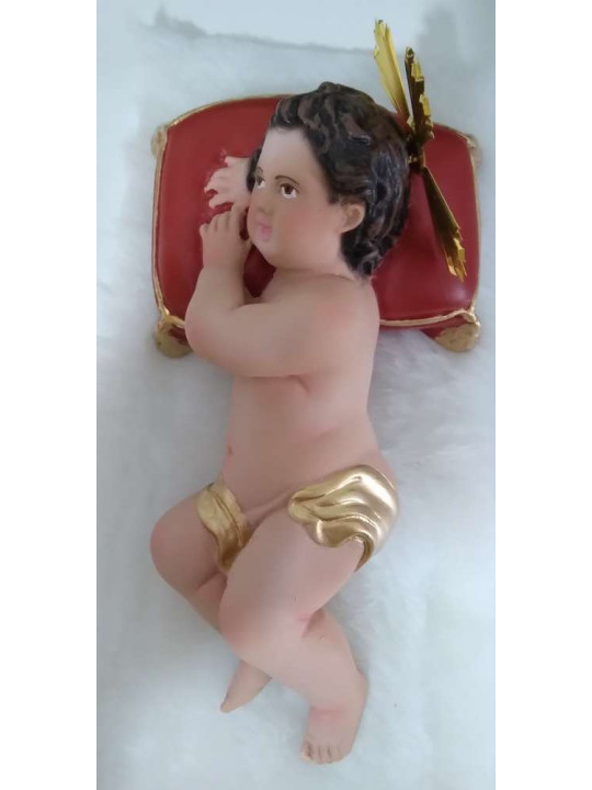 Niño Jesús con almohadón y piel 20cm.