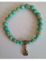 Pulsera Mineral Turquesa con Morralito del dinero.