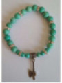 Pulsera Mineral Turquesa con Hacha Celta.